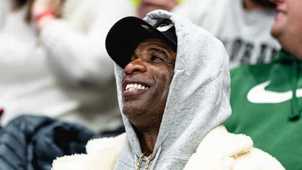 Deion Sanders takes in CU Basketball game on campus